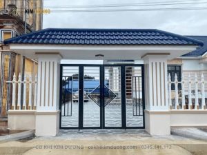 mẫu cổng mái tôn giả ngói màu xanh
